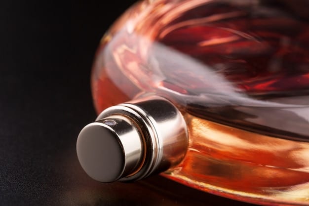 A close-up shot of a perfume bottle, highlighting the quality of the glass, the precision of the label, and the perfection of the spray nozzle, with blurred expensive perfume bottles in background.