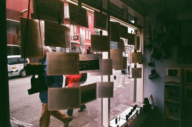 A split-screen image: on one side, a cluttered, crowded traditional retail store; on the other, a person relaxing at home on a sofa, comfortably browsing an online outlet store on a laptop. The image emphasizes the contrast between stressful in-person shopping and convenient online shopping.
