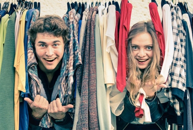 A split image showing on one side a curated selection of clothing from a secondhand store or vintage boutique, highlighting unique pieces and sustainable fashion, and on the other side, a person browsing an online clothing rental platform on a tablet, showcasing the variety of styles and brands available for rent.
